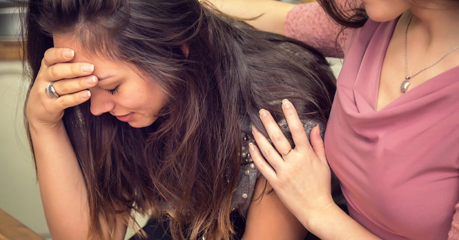 giving her friend emotional support