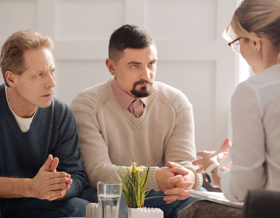 gay couple with lawyer